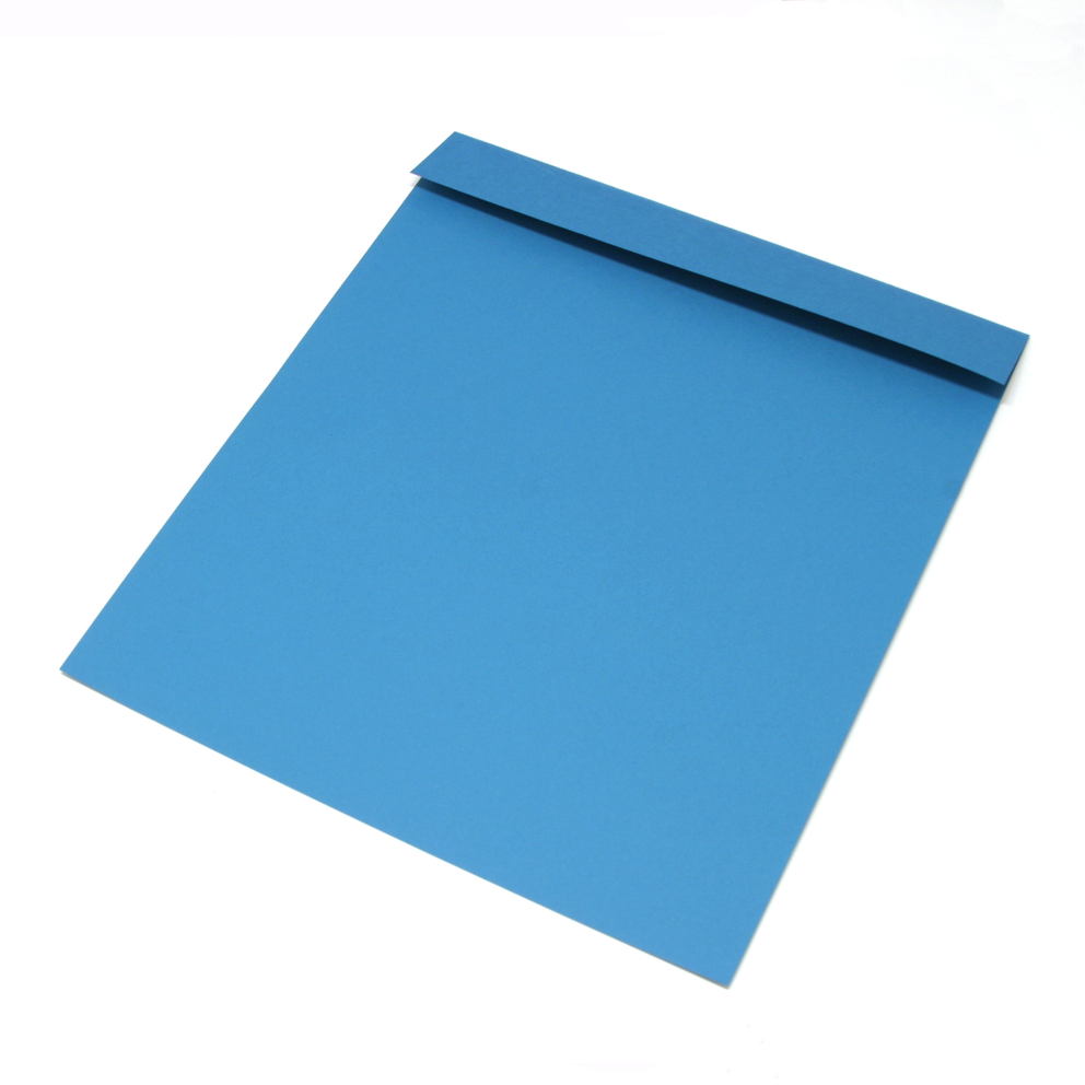 A blue piece of paper with one side folded down