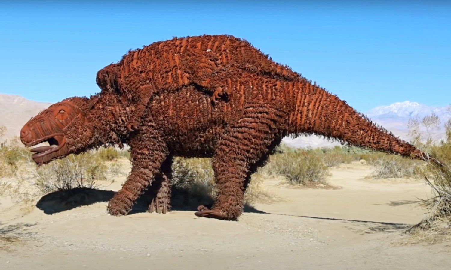 Metal sculpture of a giant sloth in Galleta Meadows near Anza Borrego State Park created by artist Ricardo Breceda