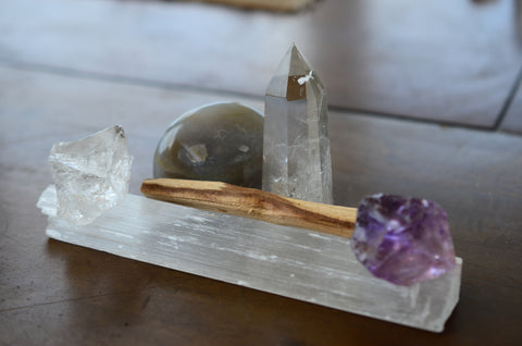 selenite and amethyst with palo santo for cleansing