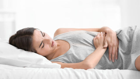 woman suffering pms symptoms