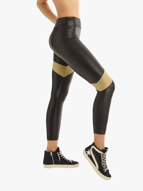 Of course JL works out in gold foil leggings and Prada trainers