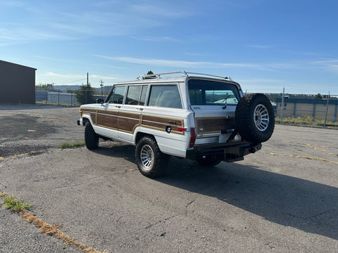 1989 Jeep Grand Wagoneer 3/4 View Back Driver Side