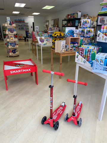 toy store with two red scooters