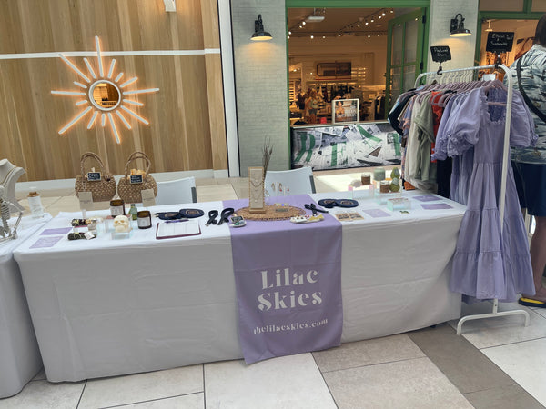 Lilac Skies booth in the middle of a mall in Manhattan Beach, California