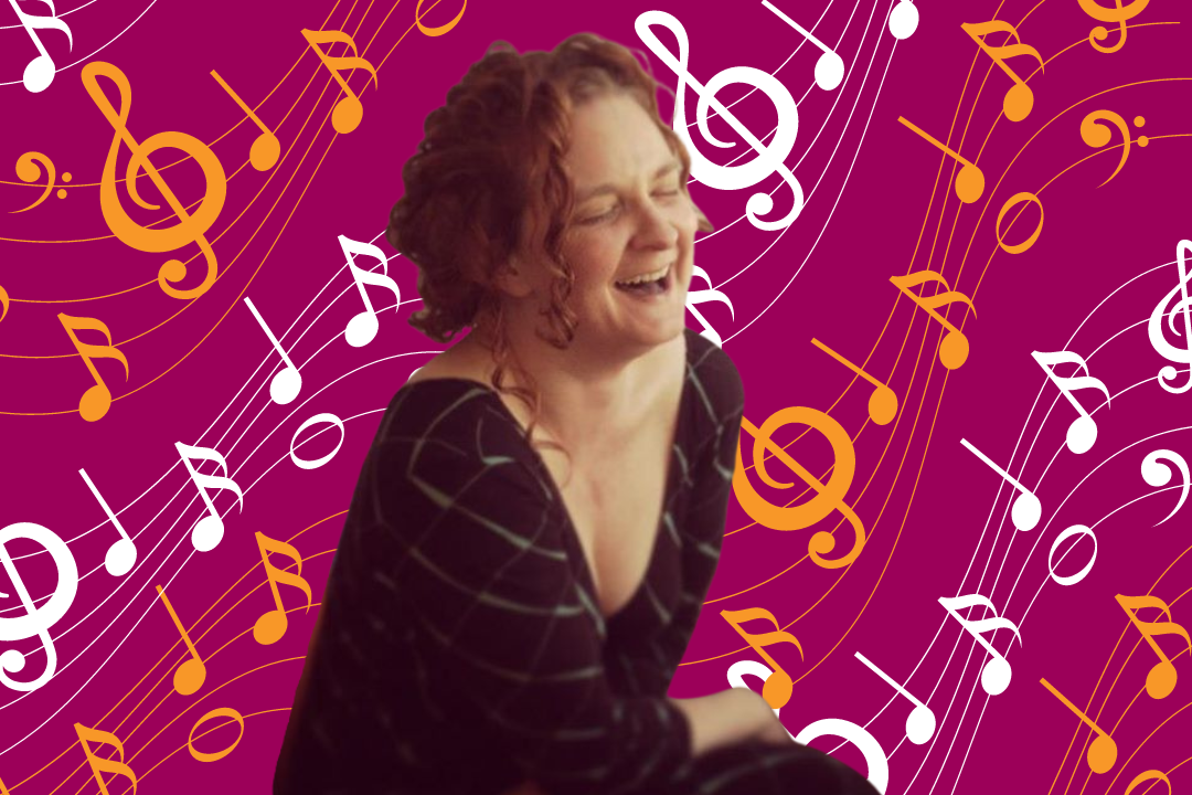 woman with curly hair laughing with a background of musical notes around her