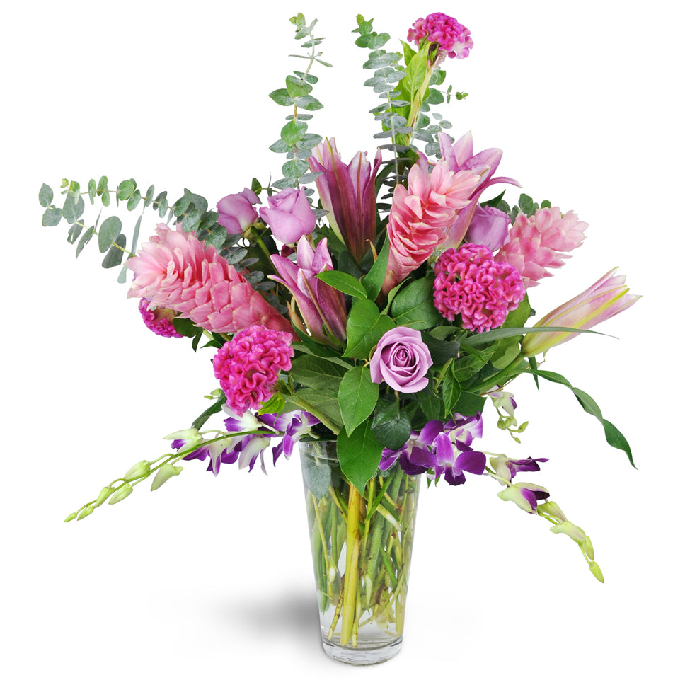 Hopelessly Devoted. Elegant and modern, this arrangement includes roses, dendrobium orchids, pink ginger, and more.