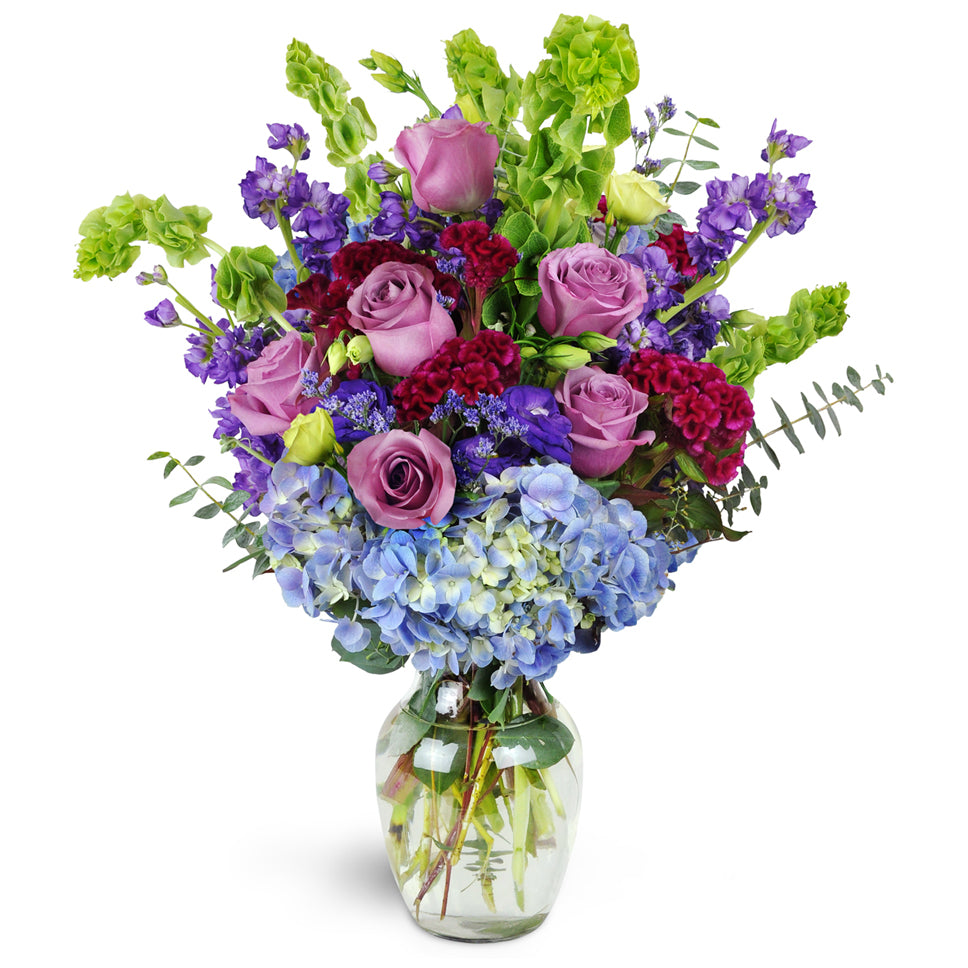 European Terrace™ - Premium. A lavish mix of roses, lisianthus, and hydrangea - this captivating arrangement is guaranteed to blow them away.