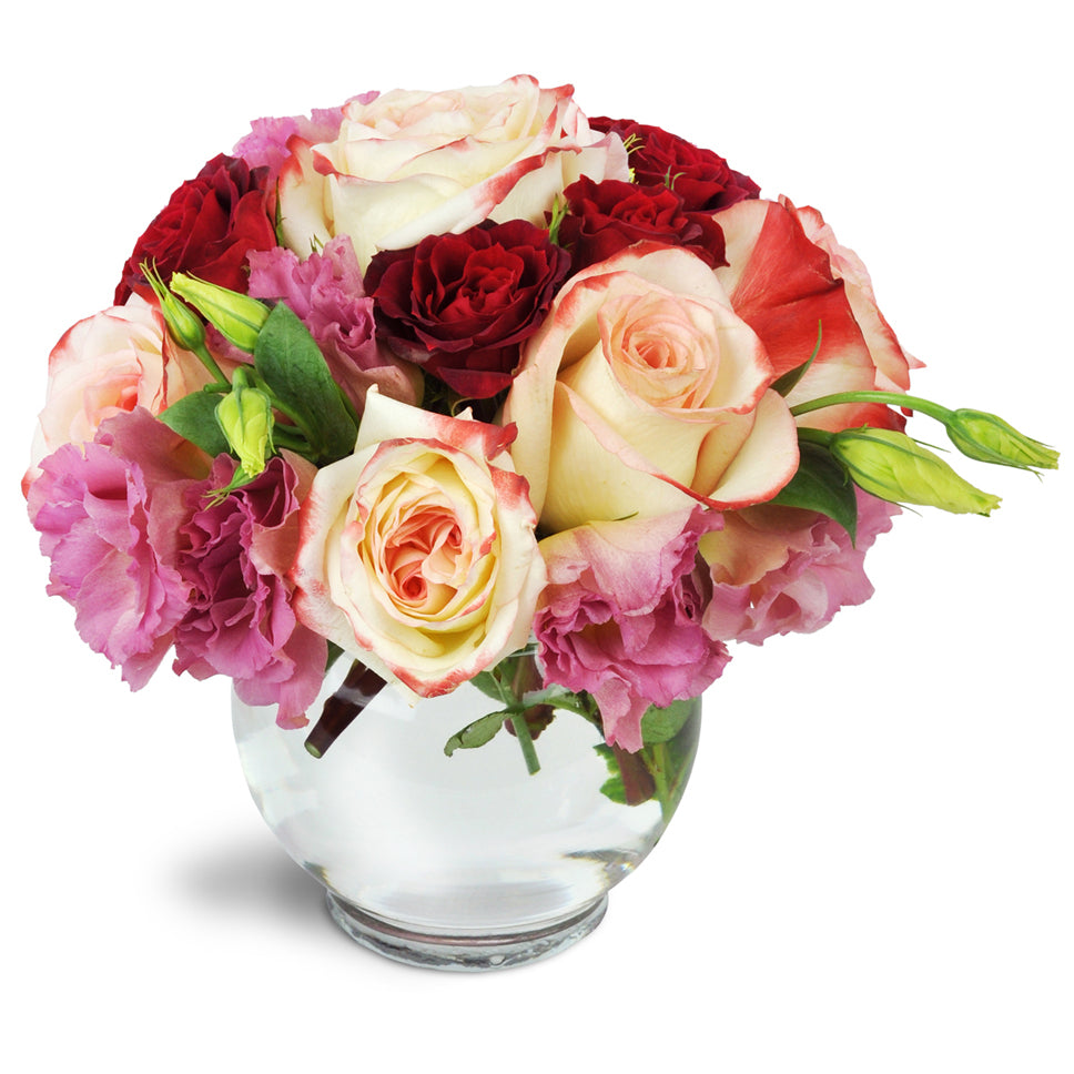 Sweet Smile™. Treat them to gorgeous roses, spray roses, and lisianthus arranged in a petite bowl.