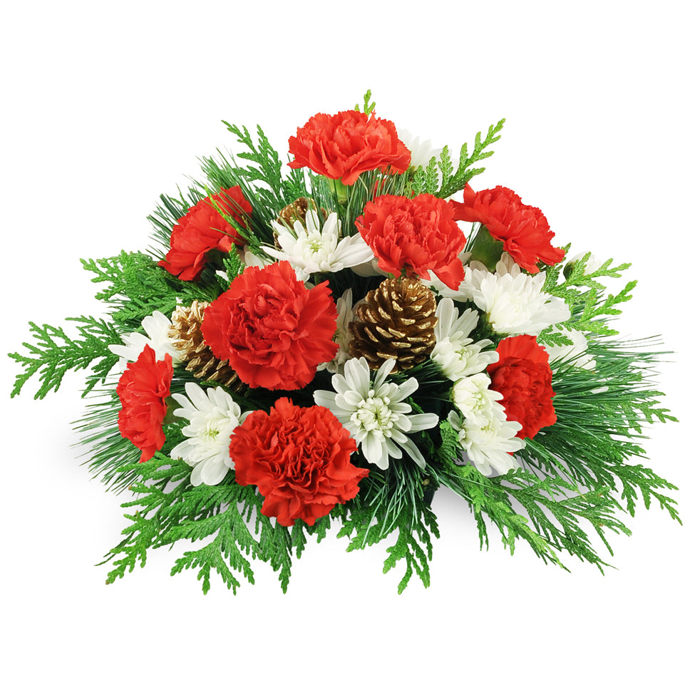 Joyful Greetings - Deluxe. Carnations and cushion spray mums are accented with cedar, pine, and pinecones.