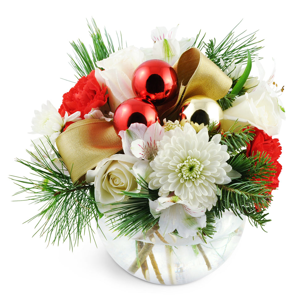 Yuletide Wishes. Roses, chrysanthemums, alstroemeria, and more are topped off with holiday baubles and ribbon.
