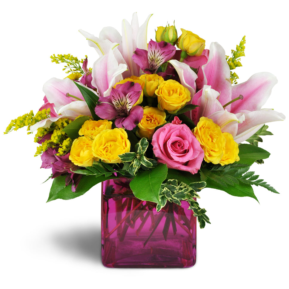 Stargazer Summer™. Wow them with Stargazer lilies, bright pink roses, yellow spray roses, and more.