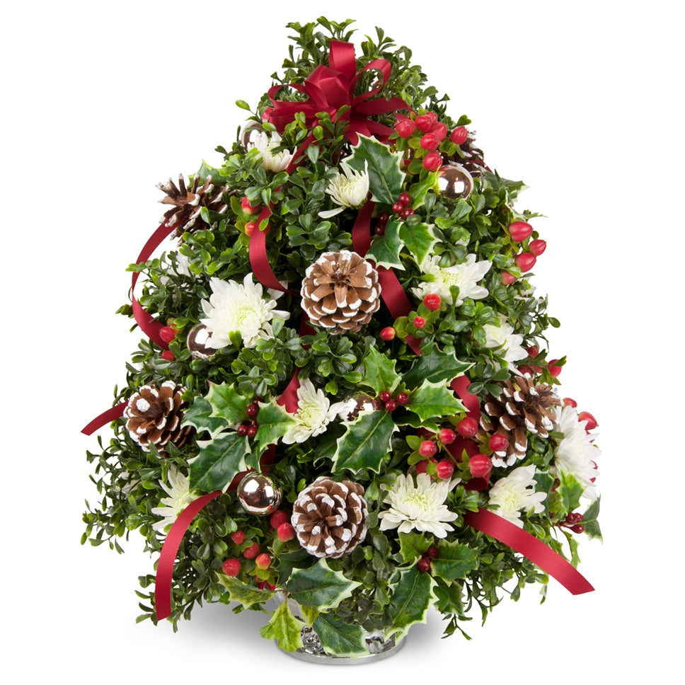 Celebration Flower Tree™ - Standard. Boxwood, holly, and more are accented with fresh blooms and cheerful ribbon.