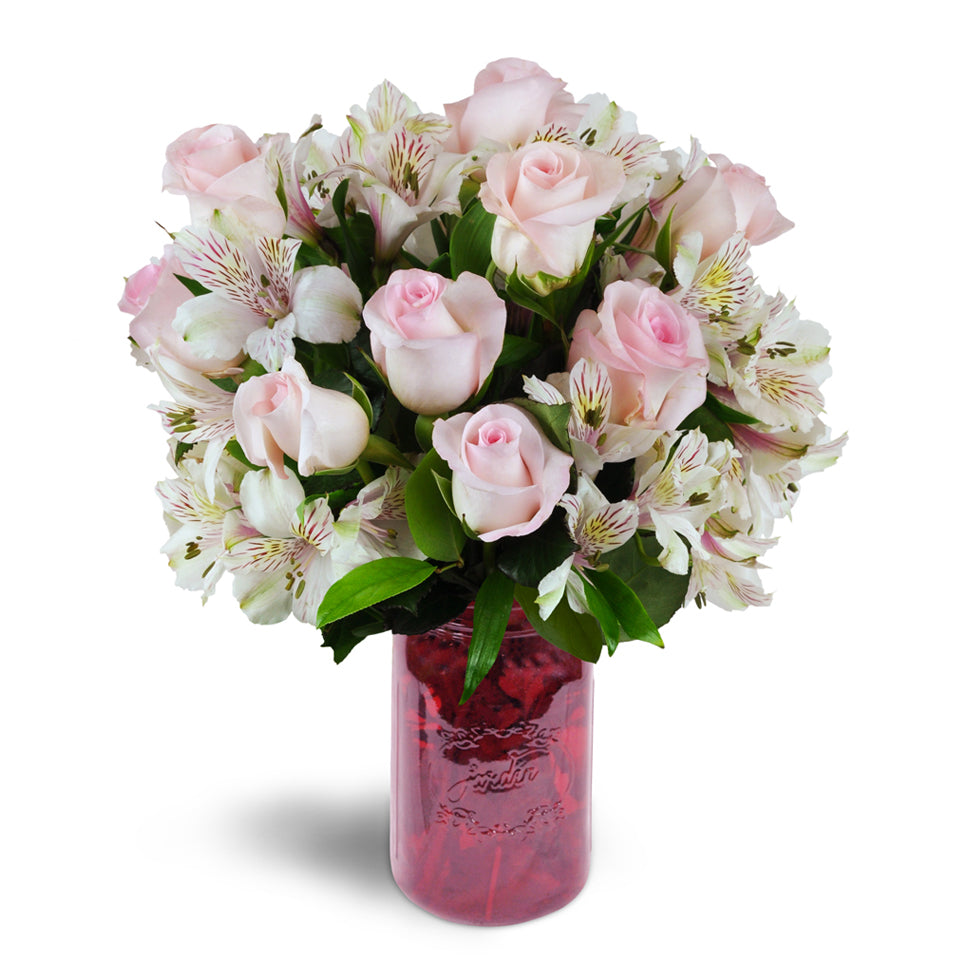 Blushing Love Bouquet - standard flower arrangement. Gorgeous pink roses and Peruvian lilies are delicately arranged into a stunning array of blooms.