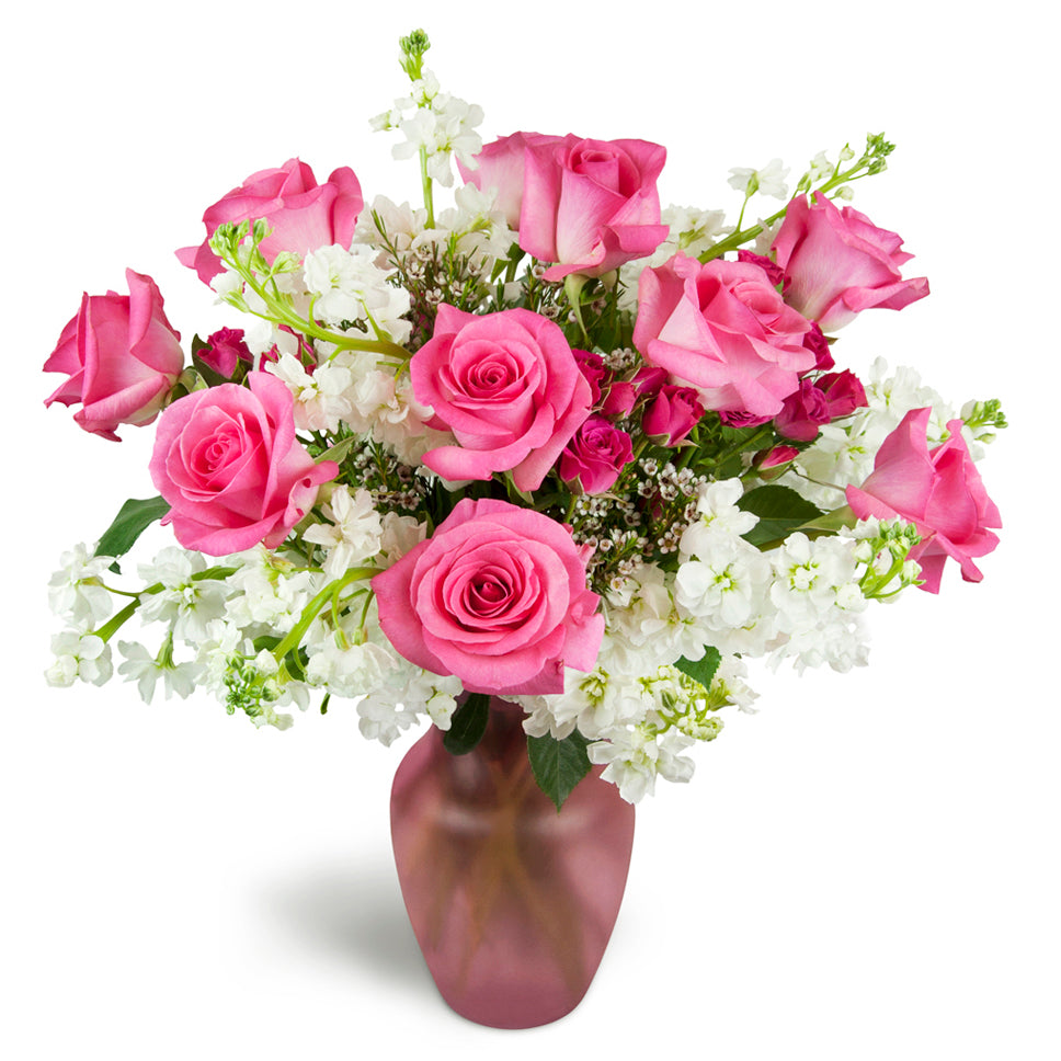 Sweet on You Bouquet™ - Deluxe. Hot pink roses are arranged with delicate white stock and charming spray roses.
