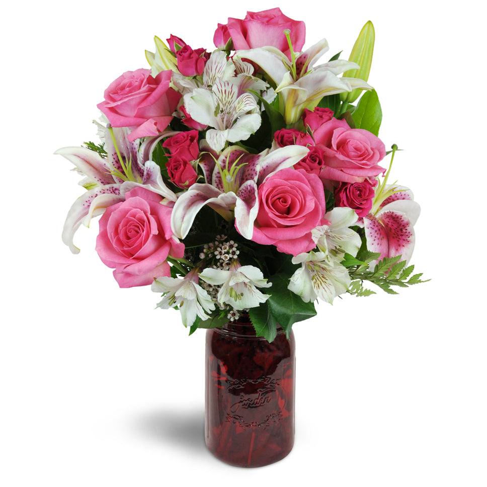 Classic Love Bouquet™ - Premium. Overflowing with pink roses, Stargazer lilies, Peruvian lilies, spray roses, and more, it's a perfect way to say I love you.