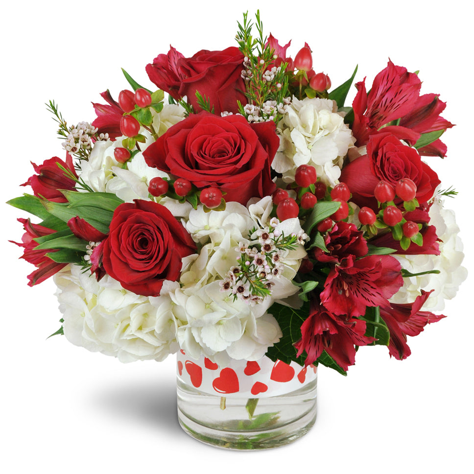 You're the One™ - Premium. White hydrangea and red Peruvian lilies are accented with waxflower, ribbon, and more. Upgrade to Deluxe or Premium to add red roses.