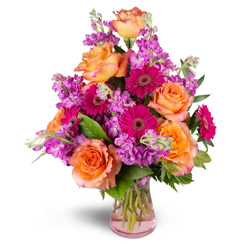 Invigorate™ - Premium. This eye-catching arrangement includes roses, mini Gerbera daisies, and more.