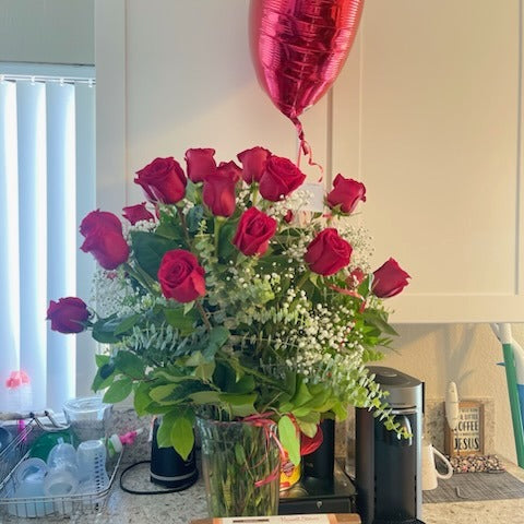 Recipient's photograph conveying thanks for Two Dozen Red Roses