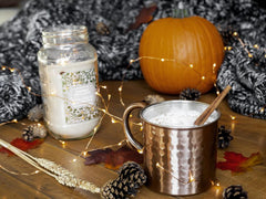 Pumpkin and mug of spiced latte