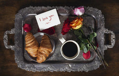 Valentine's breakfast tray with roses and coffee