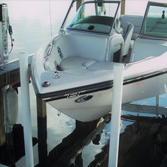 Boathouse boat lift with bow stop