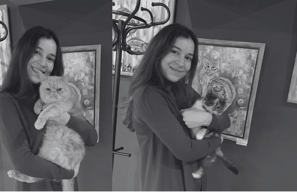 Ana with her cats.