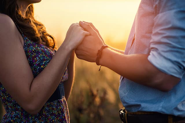 couple holding hands