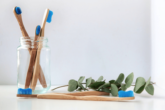 Warm, soapy water and a soft toothbrush