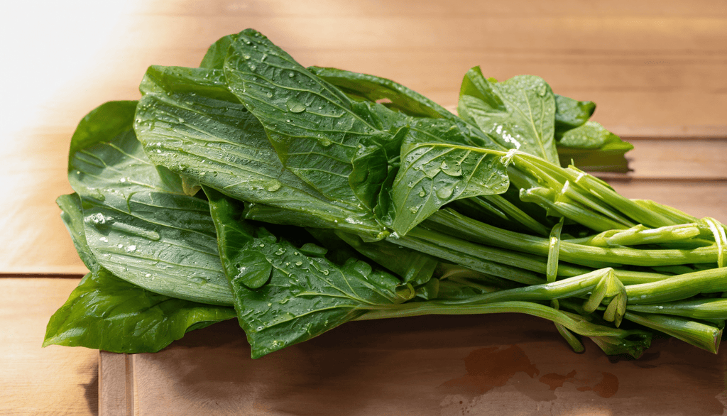 A freshly harvested bundle of sawi vegetable, with deep green leaves and crisp white stems, water droplets glistening 