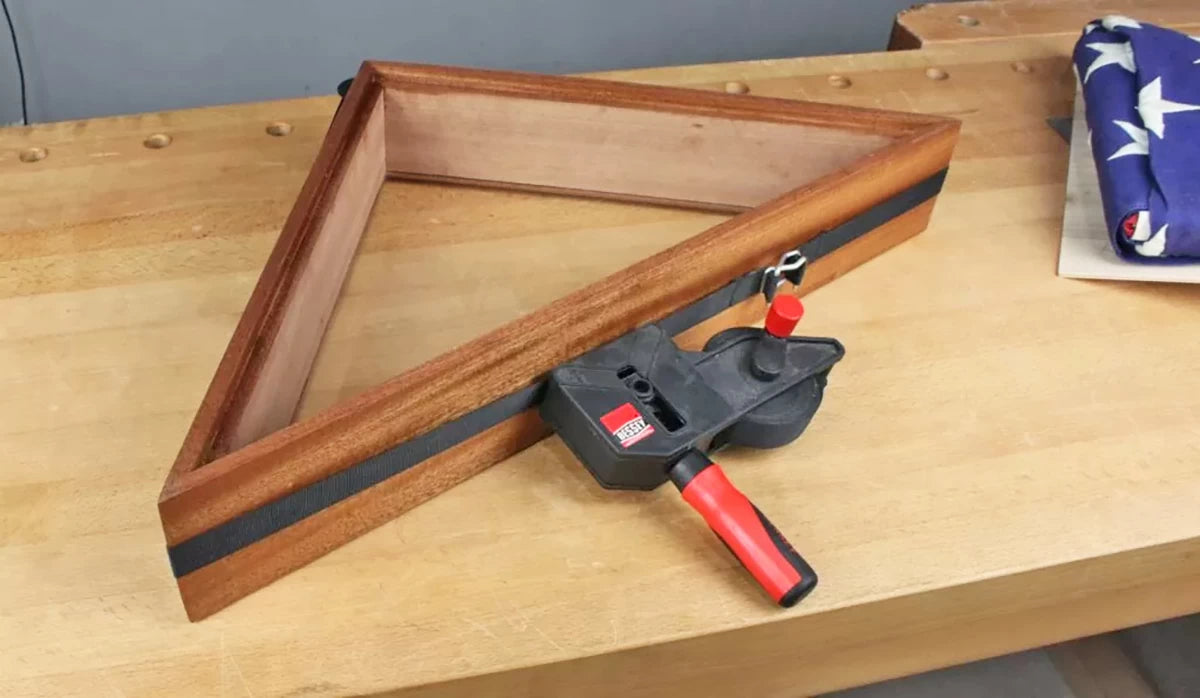 A Bessey Band Clamp 100-594 is the perfect solution for clamping the triangular shape of the flag case.