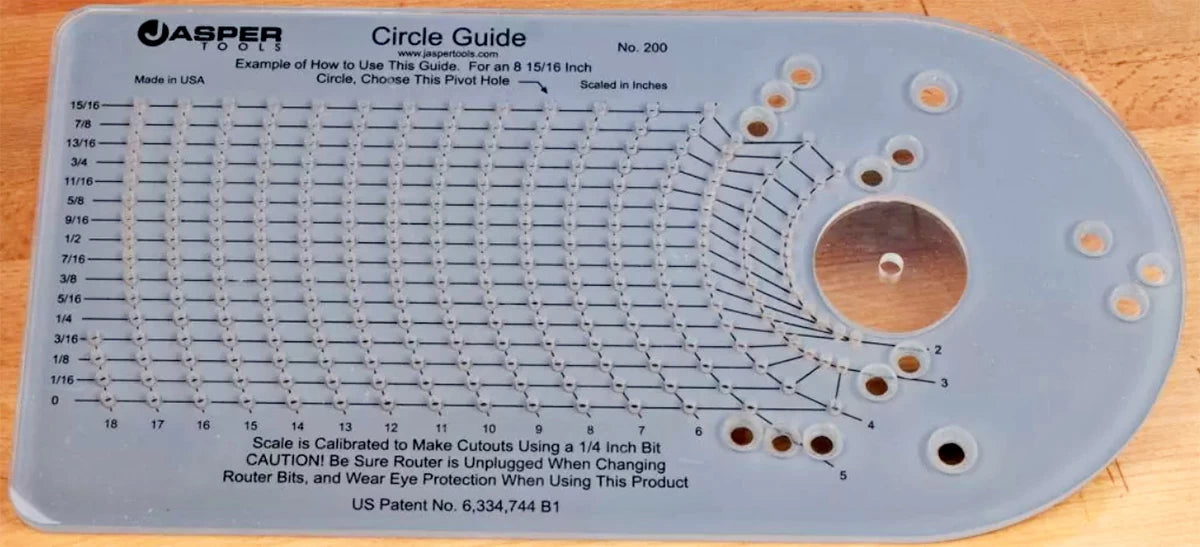 The scale on the Model 200 Circle Guide is for cutting out holes at a given diameter. (Click to view a larger image.) To cut out disks, the pivot hole value is the desired disk diameter plus twice the bit diameter (1/2