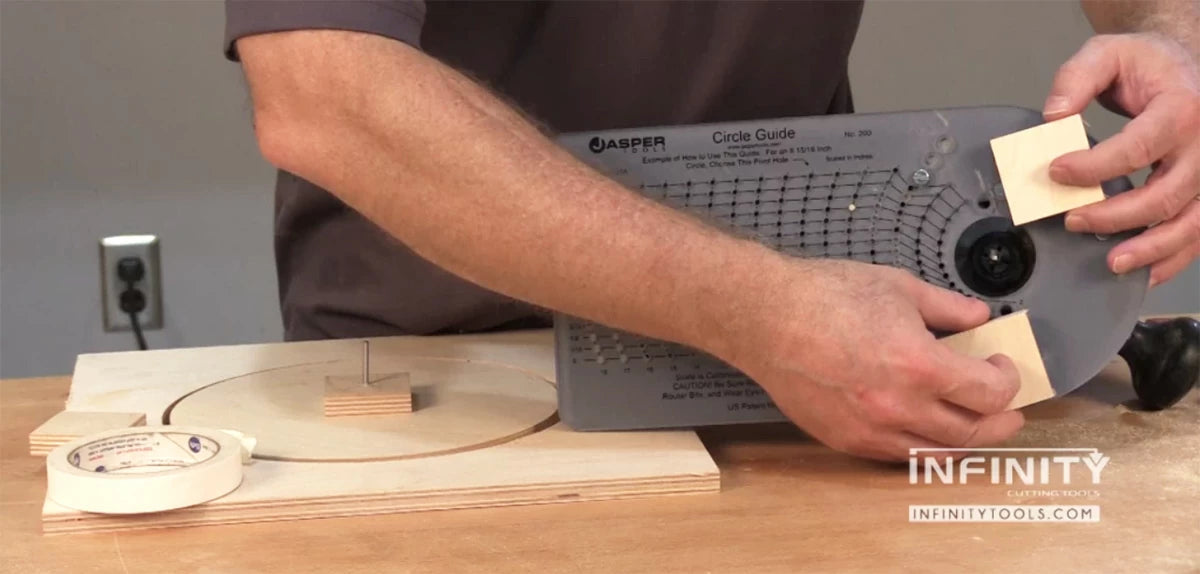 The scale on the Model 200 Circle Guide is for cutting out holes at a given diameter. (Click to view a larger image.) To cut out disks, the pivot hole value is the desired disk diameter plus twice the bit diameter (1/2