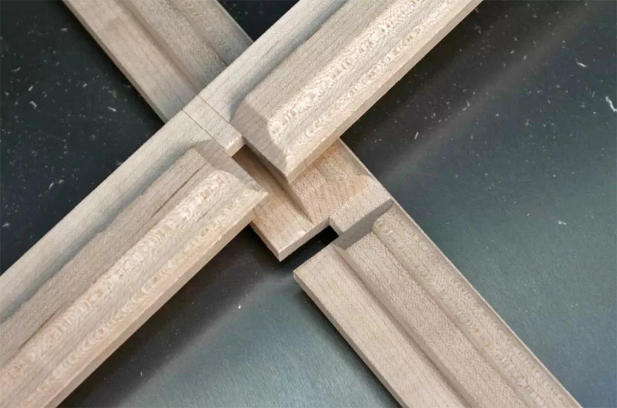 Many tutorials show making a shallow mortise-and-tenon joint at the intersection of the muntins. I find making a half lap joint to be stronger, more traditional, and easier. Not to mention it impresses the heck out of people.