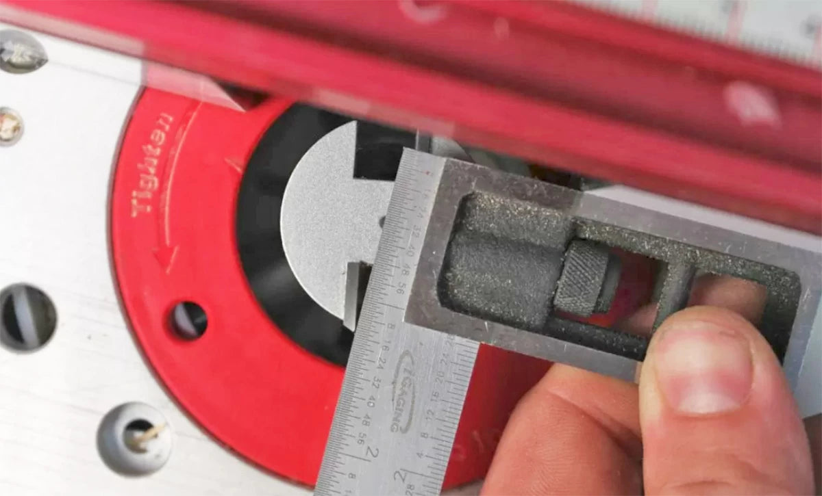 Using a square can help set the router table fence. The fence needs to be set to cut its full profile of 1/4