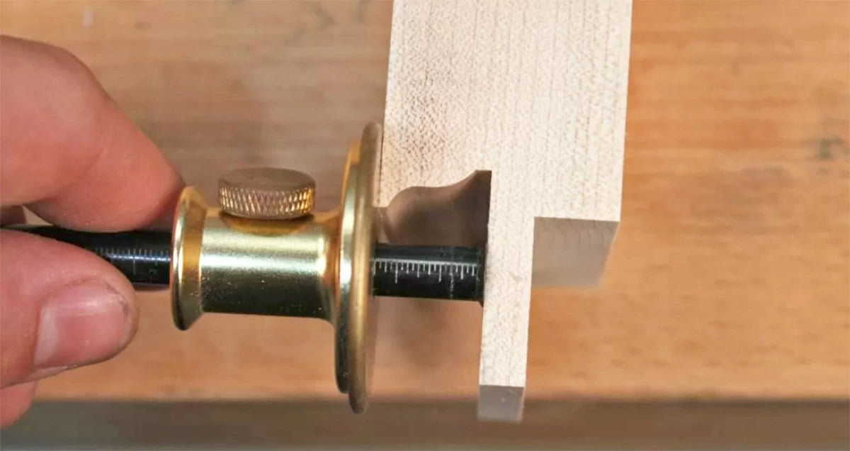 I use a wheel-style marking gauge to set the distance from the cheek of the tenon to mark out for the corresponding mortises.