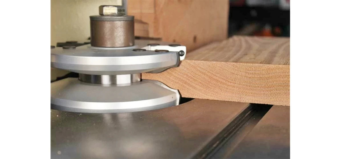 Shapers excel at removing large amounts of material quickly, producing a clean cut. This example shows cutting double raised panels for interior doors. What would take at least 4 passes at the router table, is a single pass at the shaper.