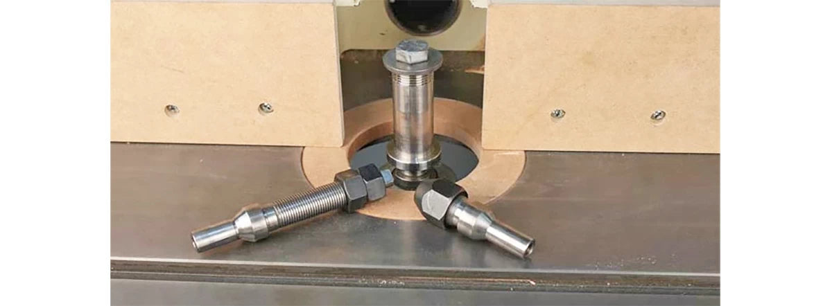 Shapers often come with an assortment of spindle diameters. Above is a shaper with a 1-1/4