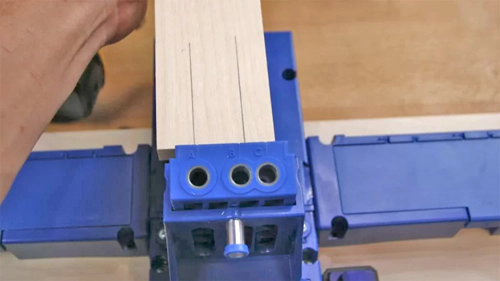 A pocket hole jig makes quick work of drilling accurate holes for assembling cabinet boxes with pocket screws.