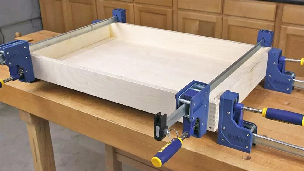 Parallel-jaw bar clamps make box assembly foolproof.