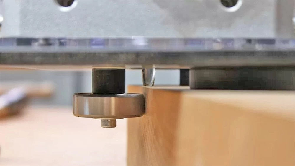 The M-Power Trim Jig For CBR7 Router Base Plate (also available separately, Item 100-098) includes a guide bearing for trimming edges flush, creating rabbets, and other routing tasks.