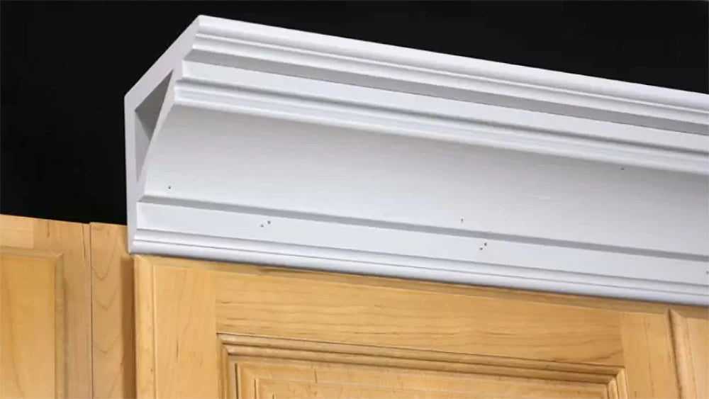 Add even more detail to your crown molding install by using a simple ogee router bit on a pair of flat pieces of stock, then install your crown molding over them for a beautiful layered appearance.