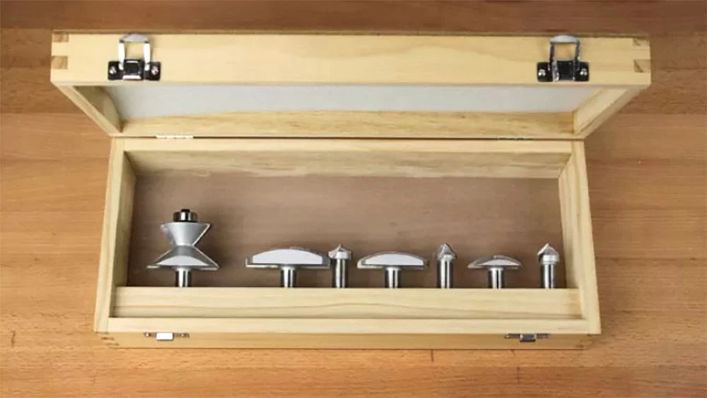 The Infinity 7-Pc Ultimate Crown Molding Router Bit Set #00-567 Comes in a customer wood box to keep the set safe and organized when not in use.