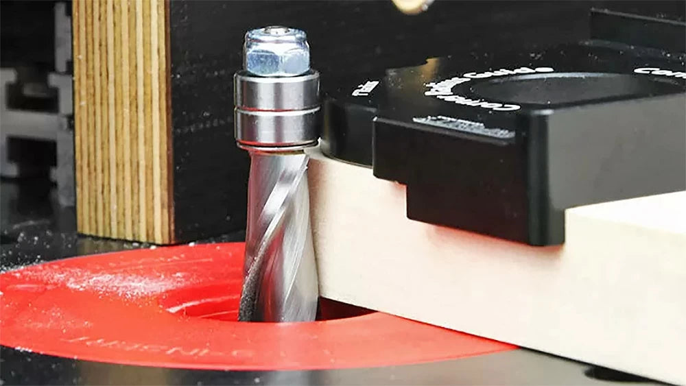 Adjust router bit height to align bearing with the radius guide.