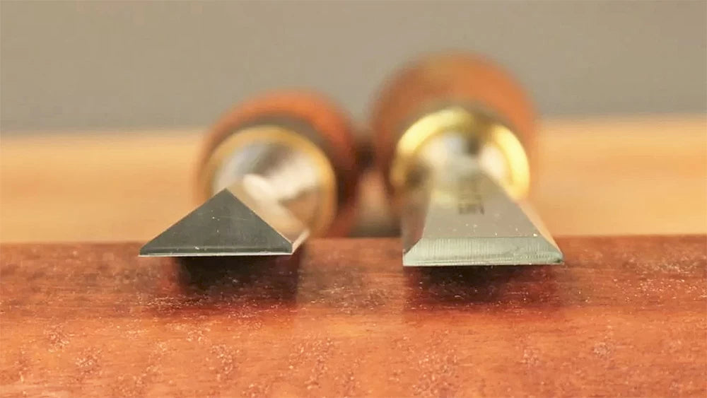 The unique triangular cross-section of a dovetail chisel (left) distinguishes it from a standard bench chisel (right).