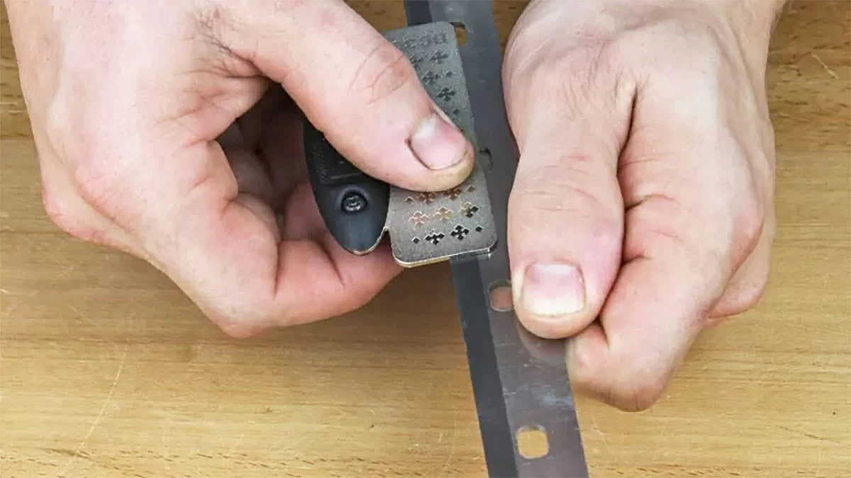 Honing a carbide-tipped knife follows the same process as with high-speed steel knives: Just a couple of light passes with a diamond hone over the back and bevel are all that's needed.