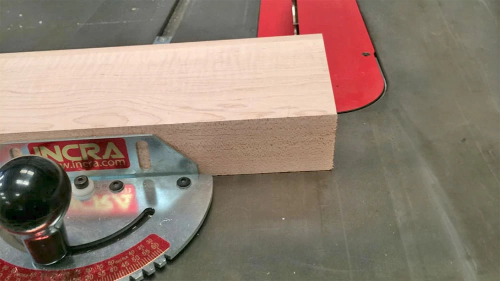 Set your miter gauge and saw blade to determine angles to cut the compound angle on the back of the arm.