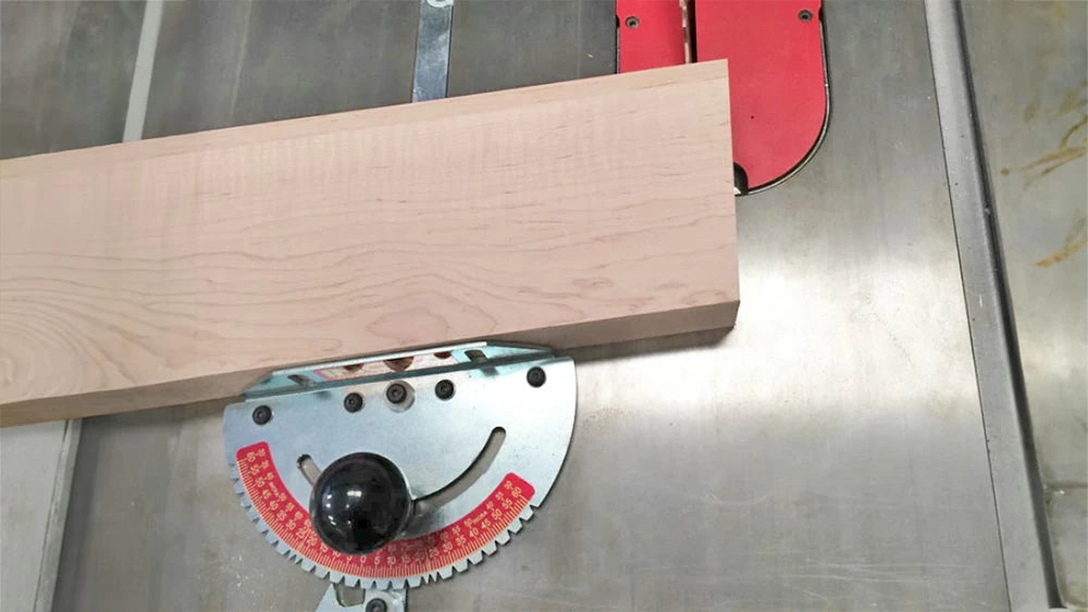 Set your miter gauge and saw blade to determine angles to cut the compound angle on the back of the arm.