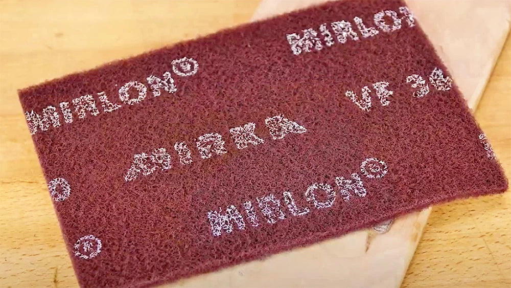 The fibers of Mirlon have sanding grit bonded to all sides so they never clog up with dust and they continuously expose fresh sanding grit as they wear.