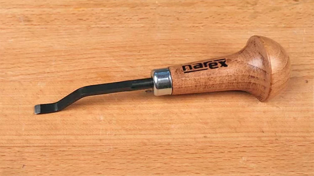 This little dog leg or Hollow-out Chisel allows the carver to create deep undercuts and exciting details that simply are not possible with other tools.