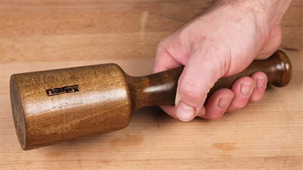 The smaller Narex carving mallet (item #101-754) fits nicely in your hand for fine tuned carving and lighter hand tool work.